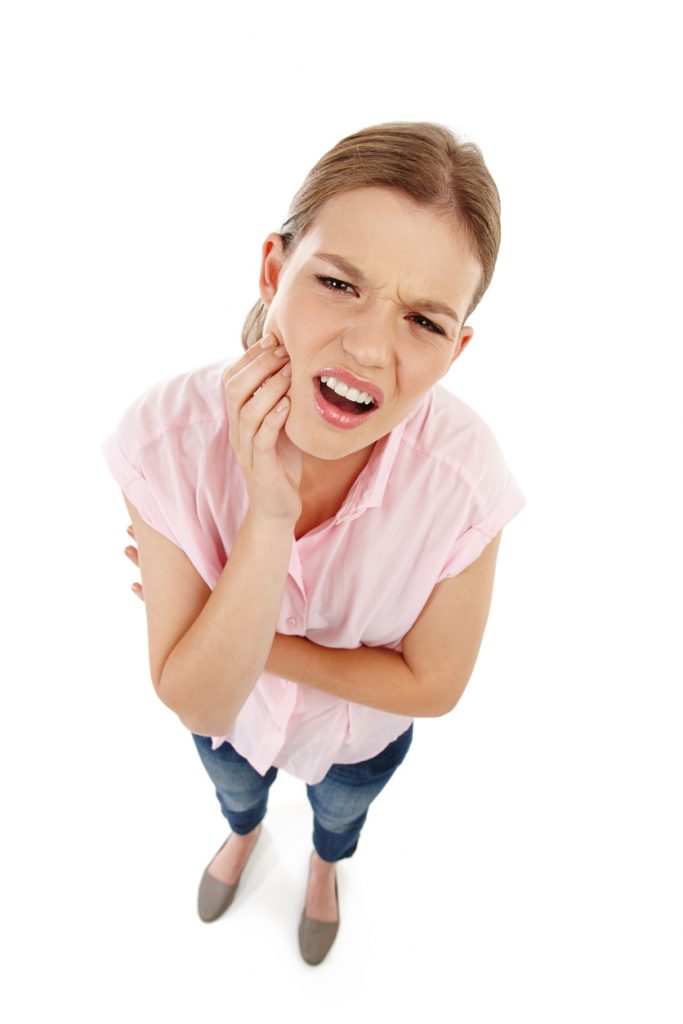 Douleur dentaire et aux mâchoires suite è une extraction ou chirurgie orthognathique aux mâchoires. Dentiste, chirurgien orthodontiste Bücco 